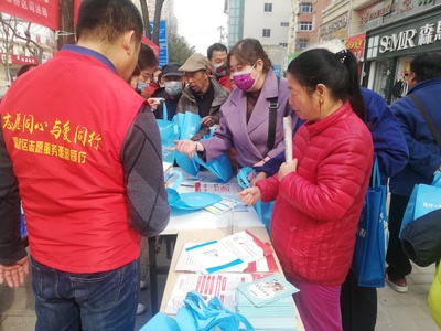 灞桥区司法局开展“学雷锋日暨三八妇女节”普法宣传活动 助力社会经济发展与妇女权益保障